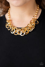 Load image into Gallery viewer, Ringing In The Bling -Gold Paparazzi Necklace